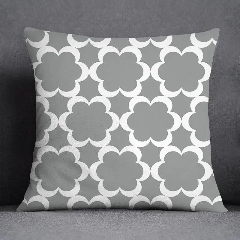 Gray throw pillow case with white geometric floral print quatrefoil pattern for living room decorbites decor
