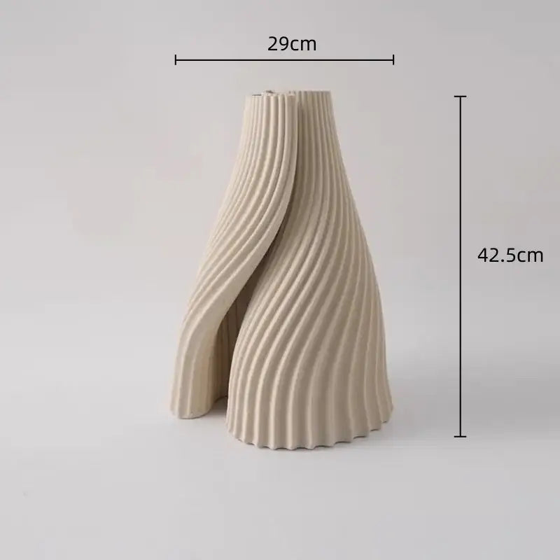 Cream-colored geometric folding ceramic vase with sculpted ribbed design for living room decor by decorbites geometric folding