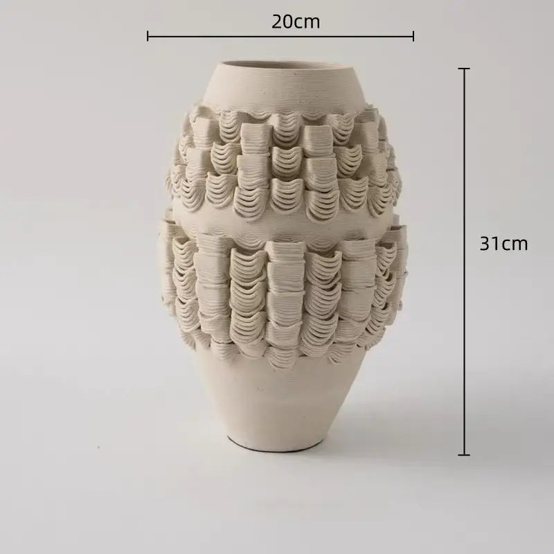 Cream-colored geometric folding ceramic vase with textured wave-like ridges for decorbites geometric folding decor