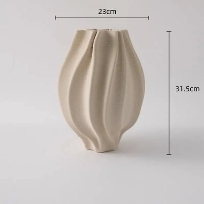 Cream-colored geometric folding ceramic vase with distinctive ribbed sculptural design for living room decorbites decor
