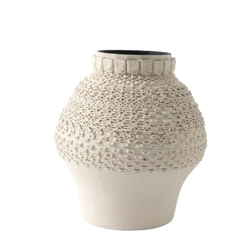 Cream-colored geometric folding ceramic vase with textured woven pattern and fluted rim for living room decorbites decor
