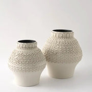 Cream-colored geometric folding ceramic vase with textured woven pattern and black interior for living room decorbites decor