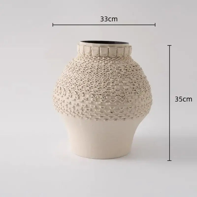 Cream-colored geometric folding ceramic vase with woven texture and fluted rim for decorbites geometric folding decor