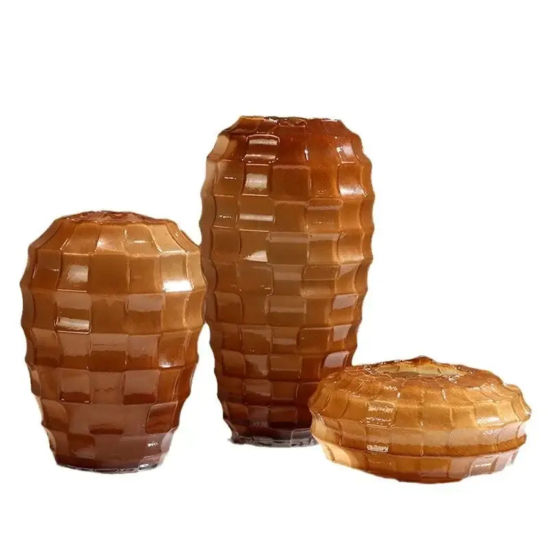 Set of three amber-colored geometric frosted glass vases with textured woven pattern for living room decorbites decor