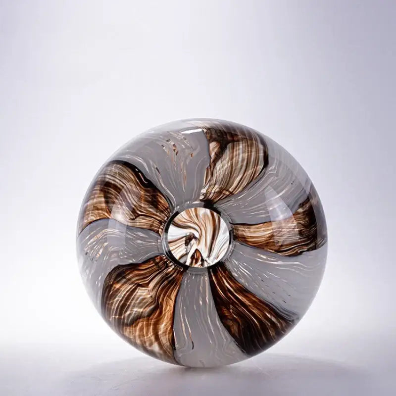 A translucent glass flower vase with swirling brown and gray patterns by decorbites geometric glass for living room decor