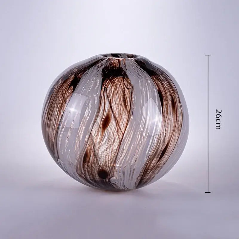 A spherical geometric glass flower vase with swirling brown and clear patterns for living room decorbites terrarium