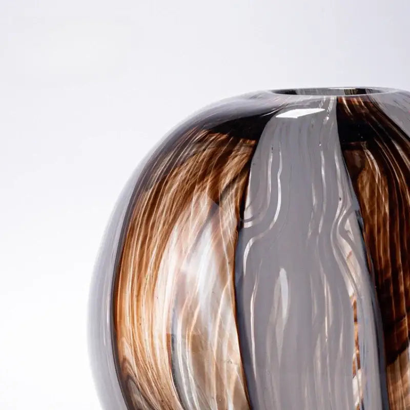 A sleek geometric glass flower vase with brown and clear swirling patterns for living room terrarium decorbites geometric glass
