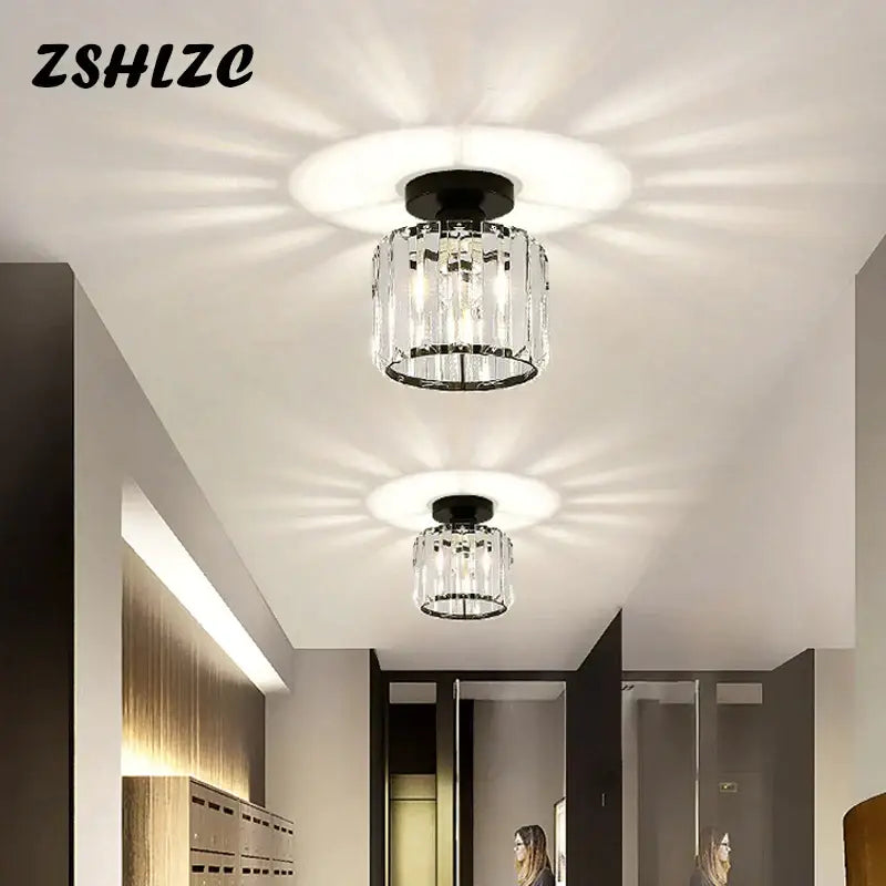 Geometric gold crystal led chandelier with black metal base and clear faceted glass panels by decorbites crystal led