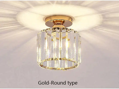 Geometric gold crystal led chandelier with vertical crystal prisms and polished brass base for living room decorbites crystal led