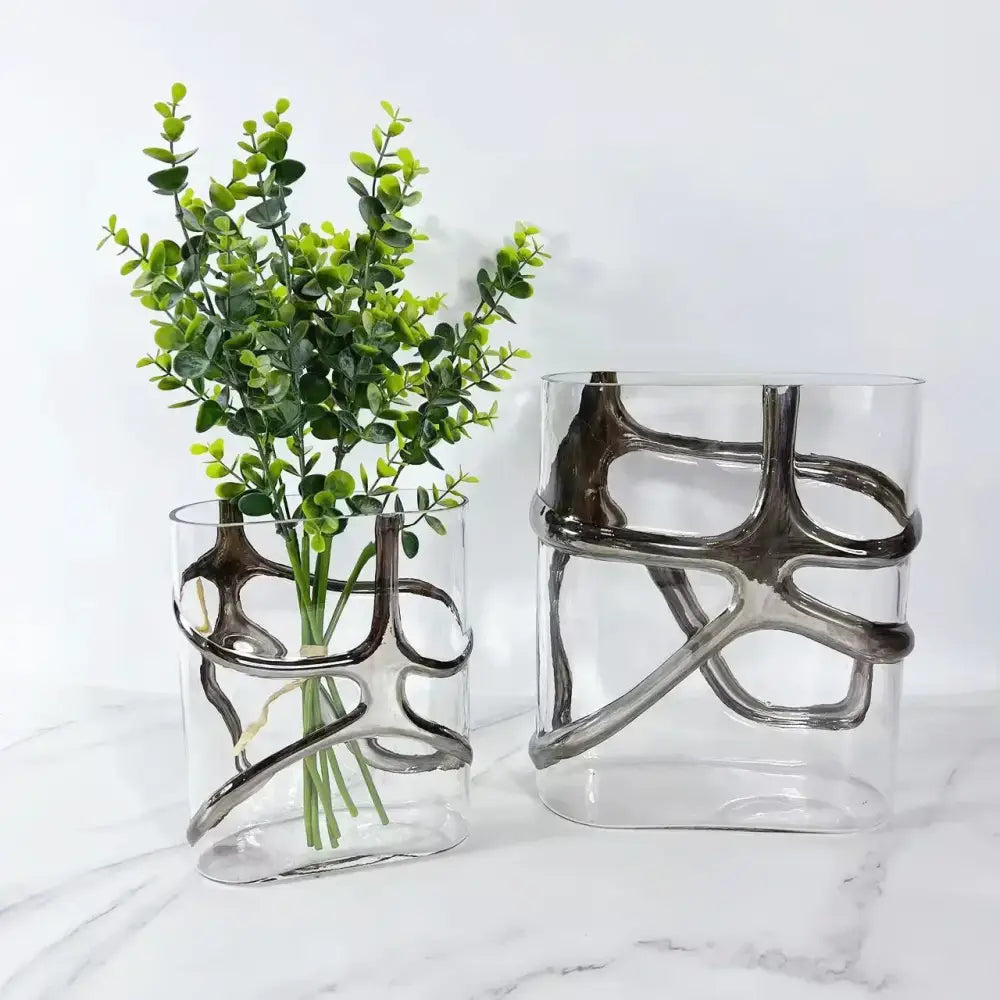 Clear glass vase with sleek silver metal accents and gold-edged glass vase for living room decorbites decor