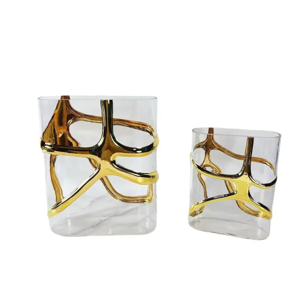 Clear glass vase with intricate gold-toned metal filigree as a decorbites gold-edged glass vase for living room decor