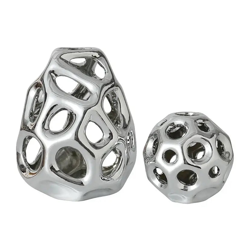 Shiny silver ceramic geometric golden hollow decorative orbs with intricate cutouts for living room decorbites decor