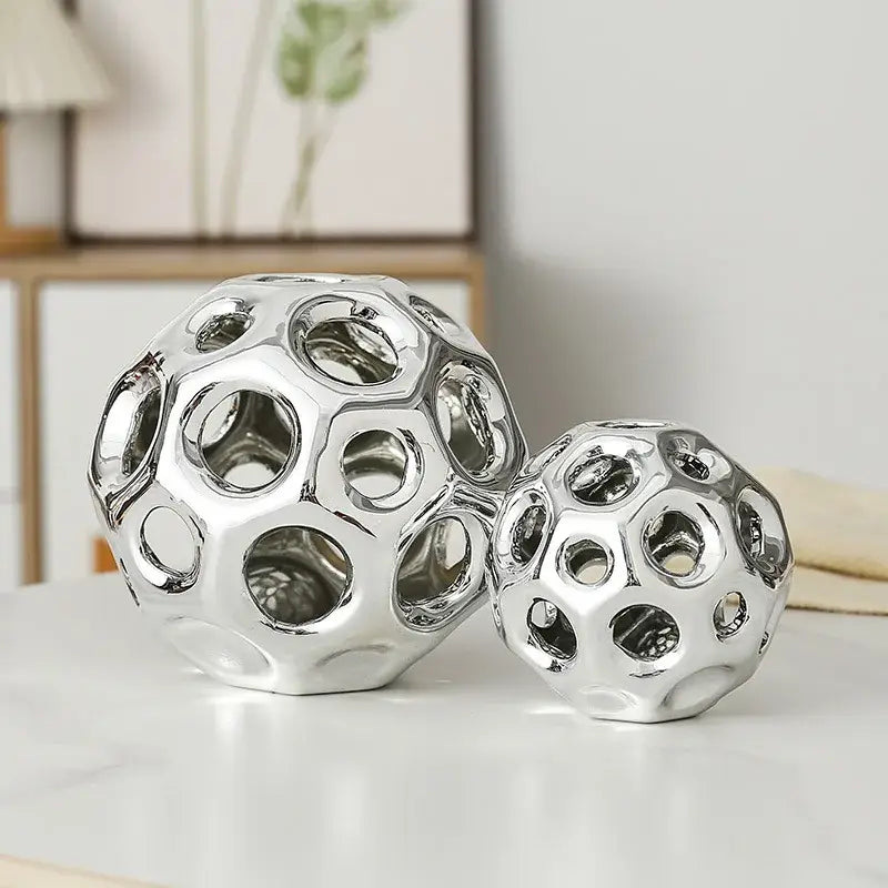 Shiny silver ceramic decorative spheres with geometric perforated design for decorbites geometric golden hollow decorbites living room decor