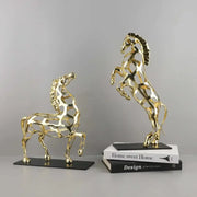 Two golden horse metal sculptures with intricate geometric patterns and polished finish for decorbites golden horse decor