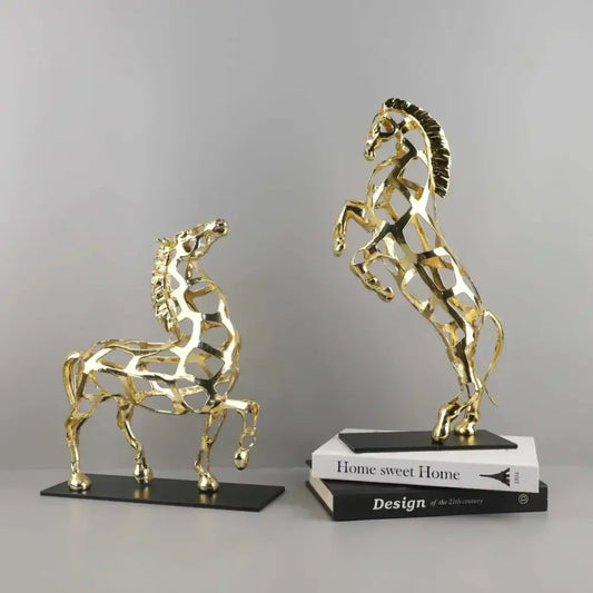 Two golden horse metal sculptures with intricate geometric patterns and polished finish for decorbites golden horse decor