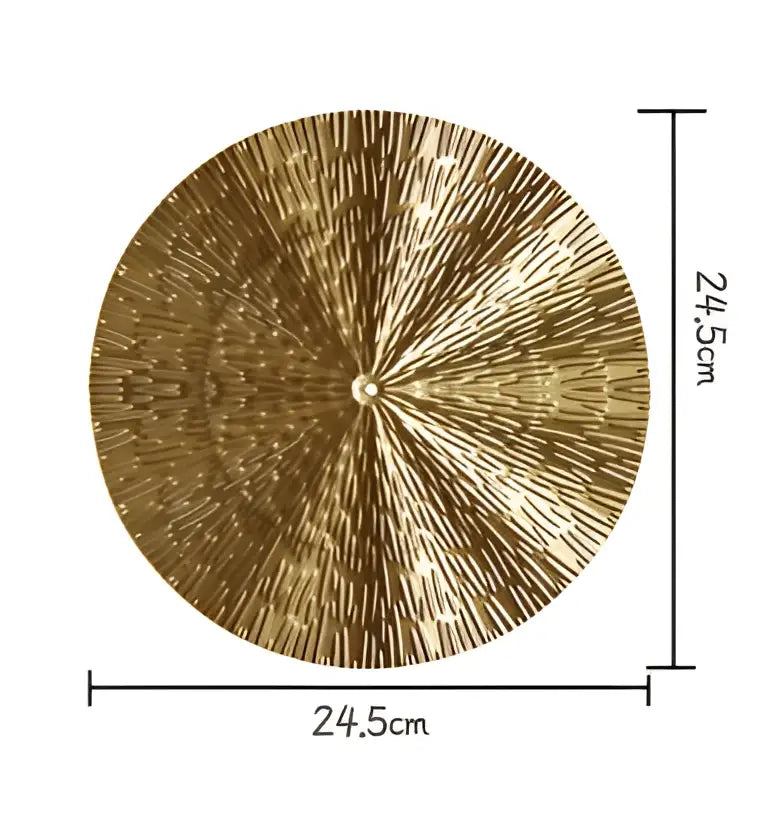 Decorbites geometric golden metal wall art featuring a textured radiating pattern with central metallic accent
