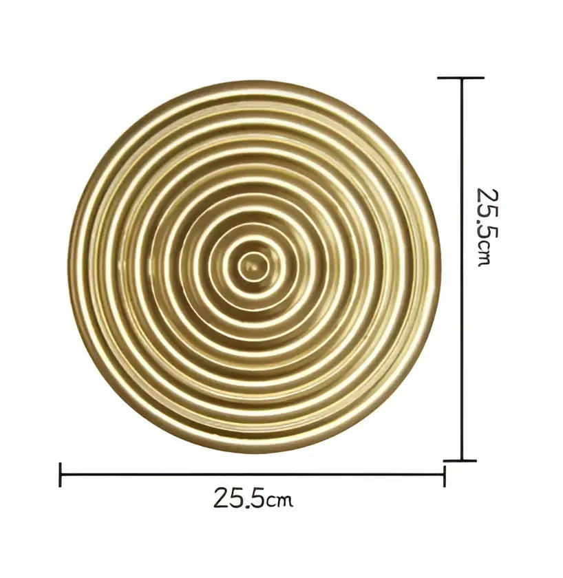 Circular brass-colored decorative plate with concentric rings 25.5cm in diameter for geometric golden metal wall decorbites decor