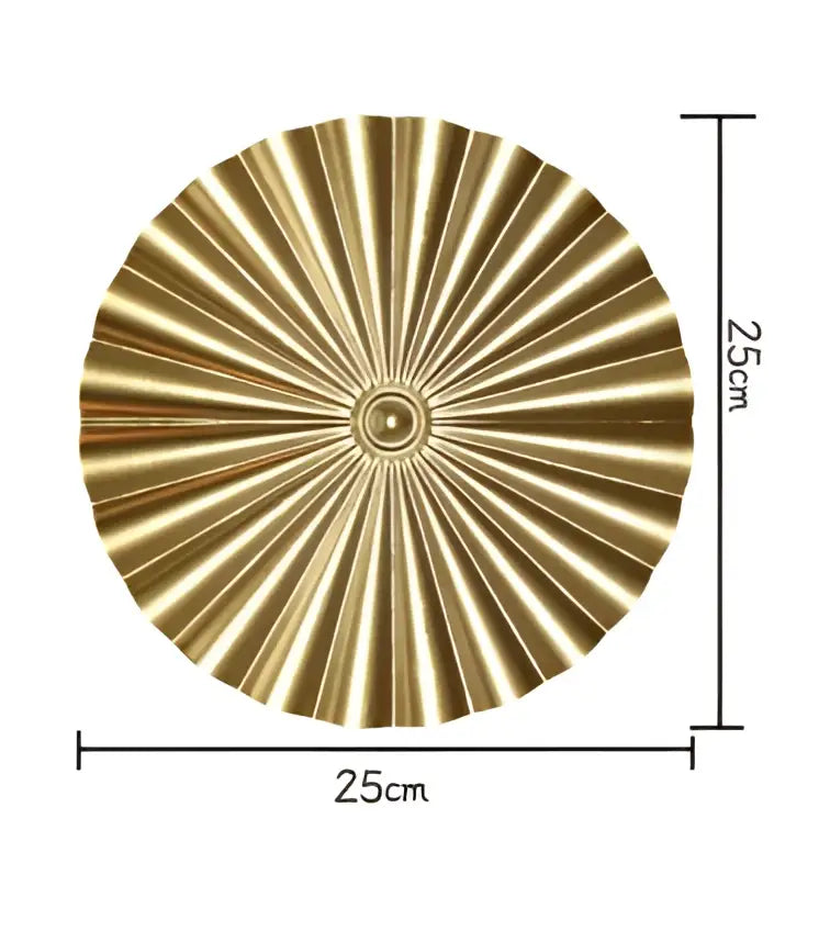Decorbites geometric golden metal wall art featuring a circular fan-shaped gold metal piece with radiating pleats