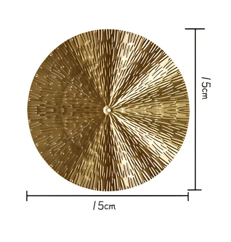 A 15cm diameter decorbites geometric golden metal wall art with radial fine line pattern for living room decor
