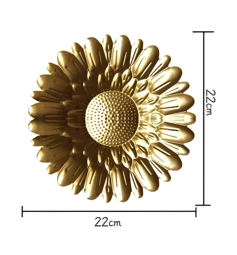 Golden metal wall art shaped like a sunflower 22cm diameter part of decorbites geometric golden metal set