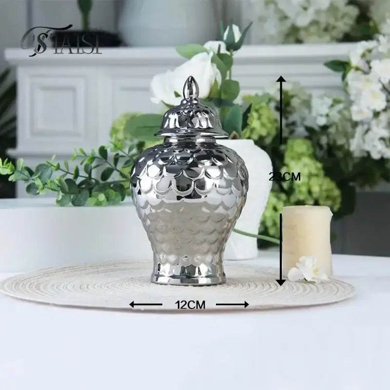 Shiny silver ceramic porcelain jar with scalloped textured surface and lid from decorbites geometric golden collection