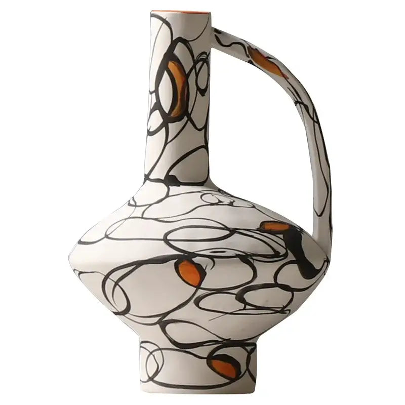 A white ceramic pitcher with geometric graffiti black line art and terracotta accents for living room decorbites decor