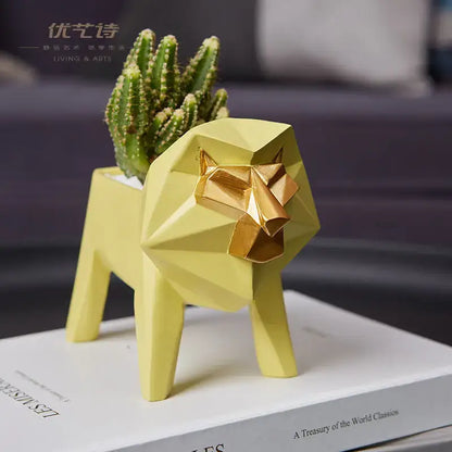 Yellow geometric lion-shaped planter with gold face holding green cactus in decorbites giraffe 3d papercraft living room decor