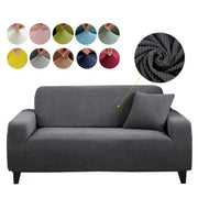Gray textured stretch sofa cover with geometric pattern and matching pillow for living room use