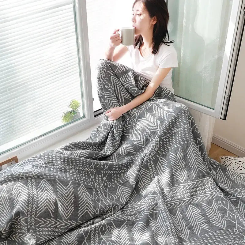 Gray and white geometric-patterned cotton gauze throw blanket by decorbites for bedroom bedspread and decor