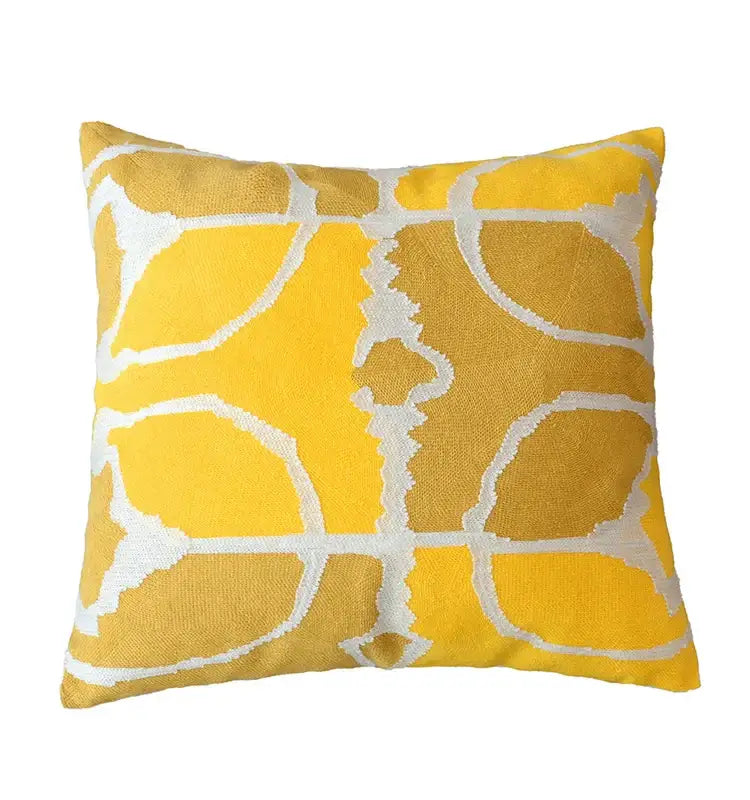 A vibrant yellow square pillow cover with white geometric pattern in cotton for decorbites grey embroidered living room decor