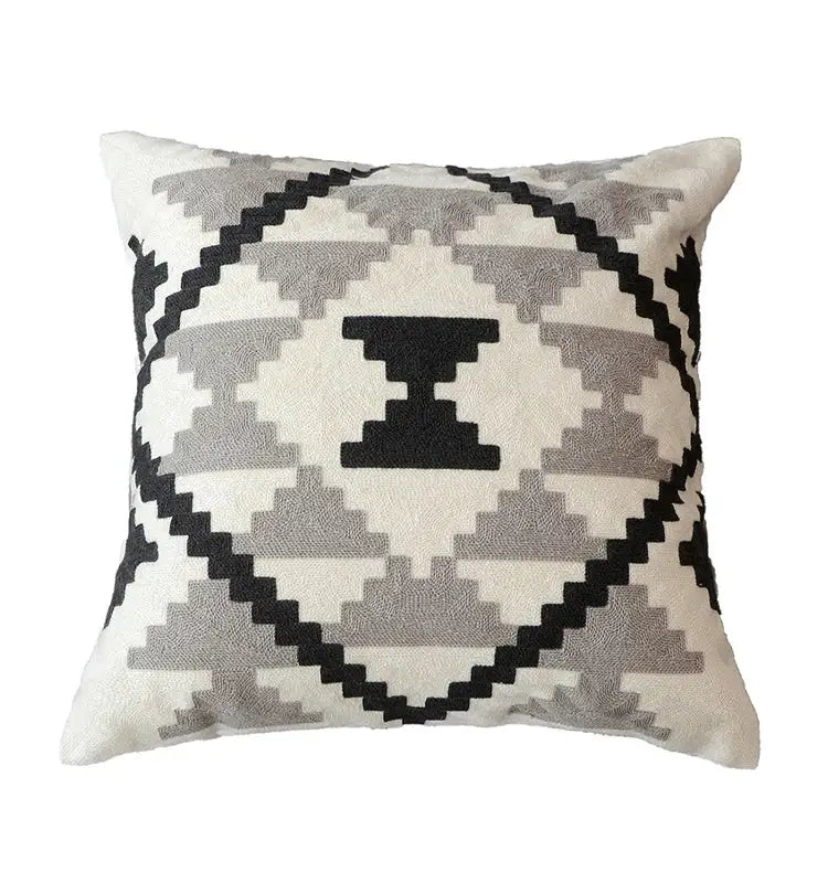 Cream-colored pillow cover with geometric black and gray pattern and embroidered design in grey embroidered cotton for decorbites decor