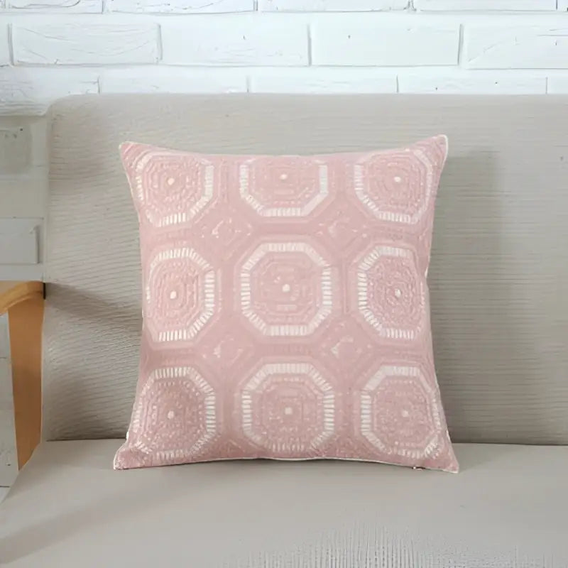A soft pink cushion cover with off-white geometric pattern and embroidered octagonal design for decorbites grey pink decor