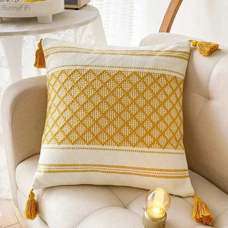 Cream-colored cushion cover with mustard-yellow woven diamond pattern and tassels for decorbites blue diamond jacquard decor