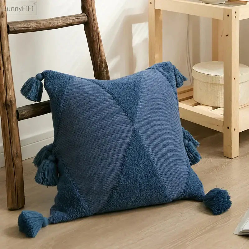 Blue textured throw pillow featuring tassels at each corner as a decorbites knitted mustard blue cushion cover decor