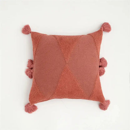 A cozy terracotta knit pillow with textured diamond pattern and tassels for decorbites knitted mustard blue cushion cover decor