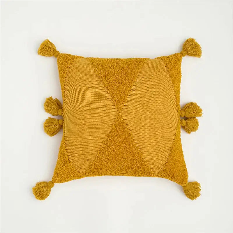 Mustard yellow textured cushion cover with diamond-shaped knit pattern and tassels for decorbites knitted mustard blue decor
