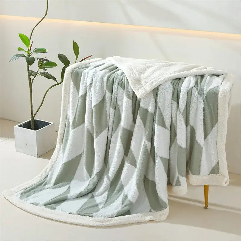 A soft geometric lamb wool blanket in lavender and white with a plush fleece lining for cozy decorbites geometric lamb decor