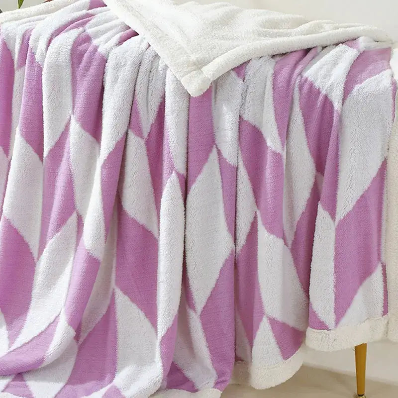 A plush lavender and white geometric lamb wool blanket with cozy fleece lining perfect for bedroom decorbites geometric lamb throw
