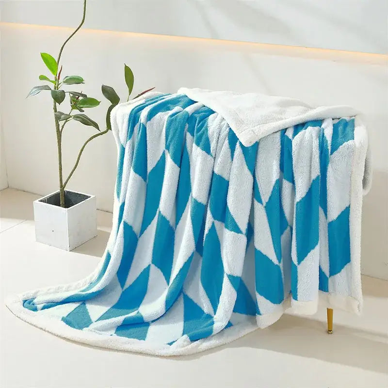 Blue and white geometric lamb wool blanket with plush soft fleece texture perfect for cozy bedroom decorbites geometric lamb throw