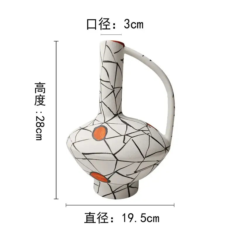 White ceramic vase with black crackle glaze and orange accents featuring an integrated handle for geometric line ceramic decorbites fringe decoration