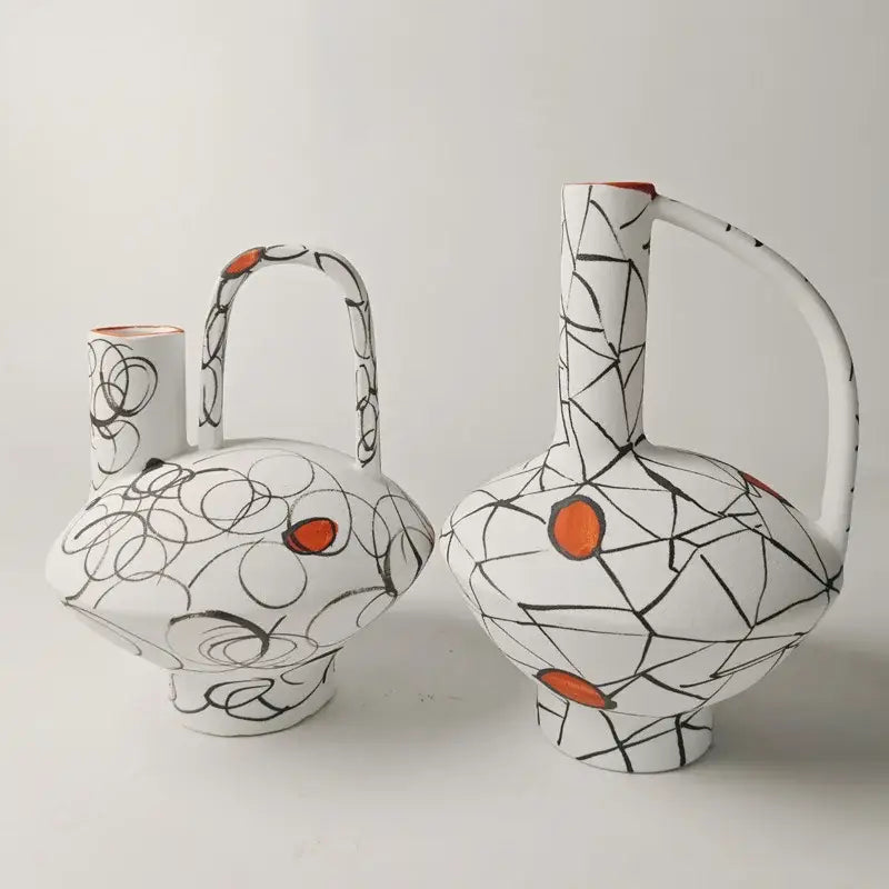 Two white geometric line ceramic vases with black abstract lines orange accents and handles for living room decorbites fringe decoration