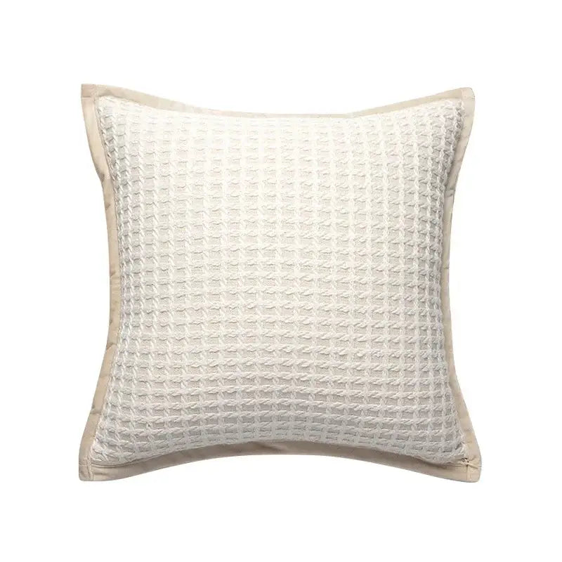 Cream-colored waffle-weave pillow with subtle beige border complementing decorbites geometric line embroidered suede pillowcase
