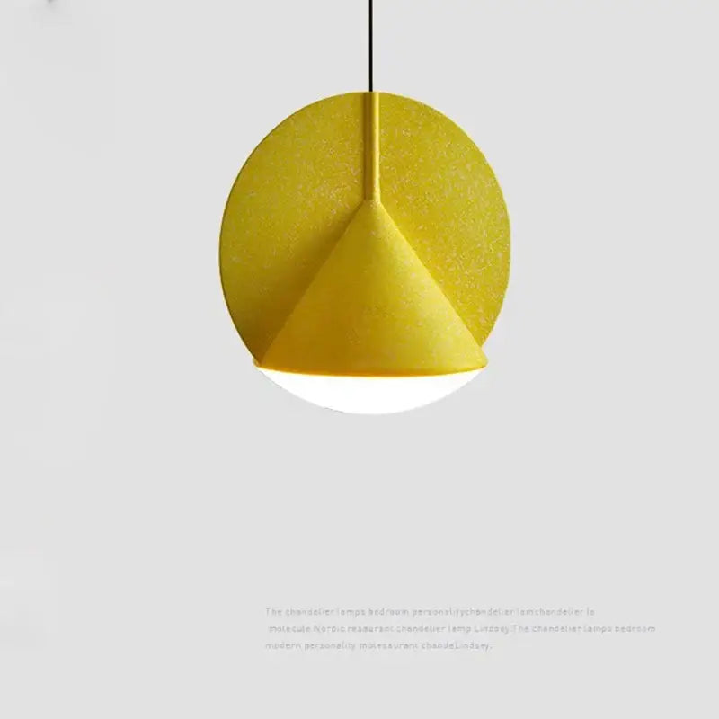 A modern geometric matte copper and charcoal gray pendant lamp with yellow disc design and soft glow for kitchen decorbites colorful led ceiling