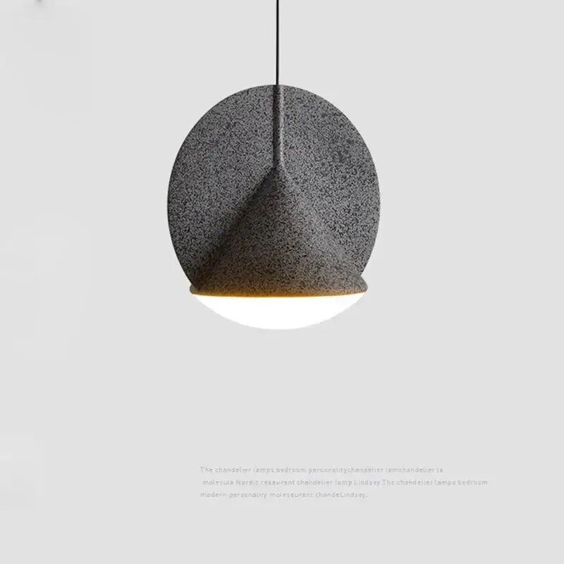 A modern pendant lamp with a textured dark gray shade and white illuminated base for decorbites colorful led ceiling