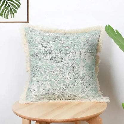 Square mint green cushion cover with subtle distressed pattern cream fringed edges decorbites cotton crochet tassel
