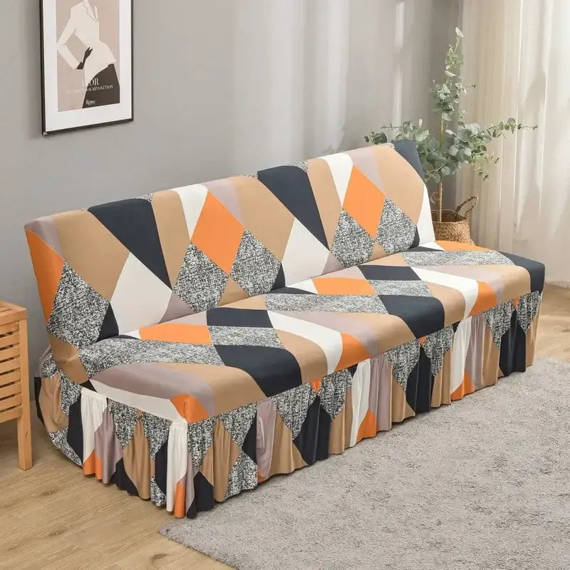 Cozy living room futon sofa covered with elastic armless sofa cover featuring bold orange black geometric triangles
