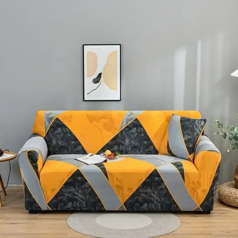 A vibrant yellow gray and black geometric-patterned marble texture stretch sofa cover from decorbites colorful block