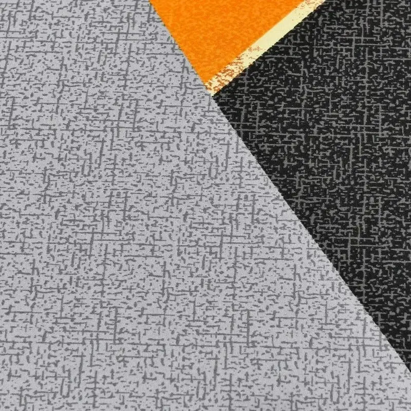 Geometric orange and gray colorful block sofa covers with textured woven pattern and orange triangular accent for living room decorbites colorful block sofa