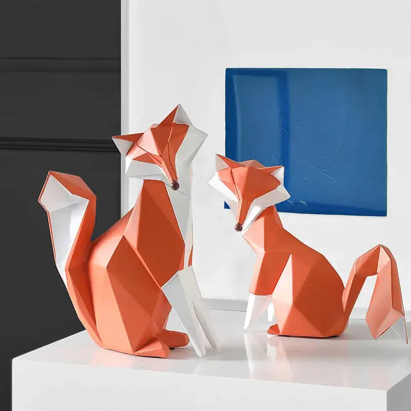 Geometric orange and white decorbites fox figurine with modern angular design for living room decor