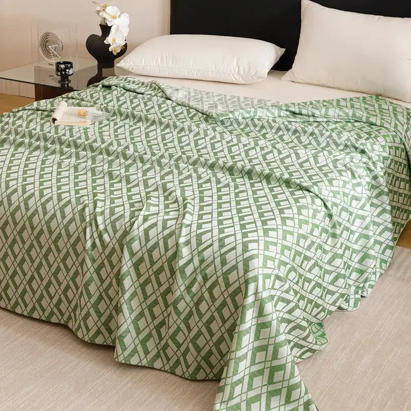 Green and white geometric patterned bedspread made of lightweight bamboo fiber summer material for decorbites bedding